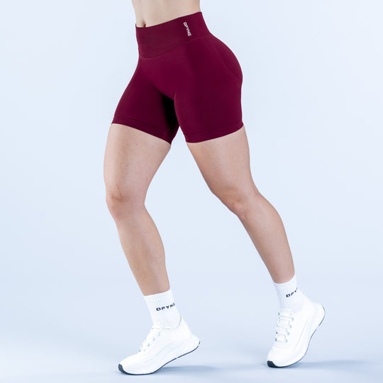 6.5-inch maroon athletic impact shorts with small logo at waistband, front view.