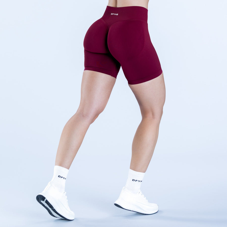 6.5-inch maroon athletic impact shorts with small back logo, rear view.