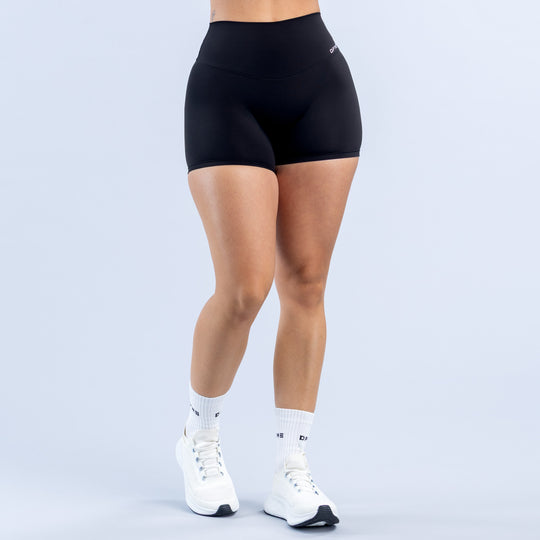 Women's black 4.5" biker shorts with front logo mark and high-stretch leg fit