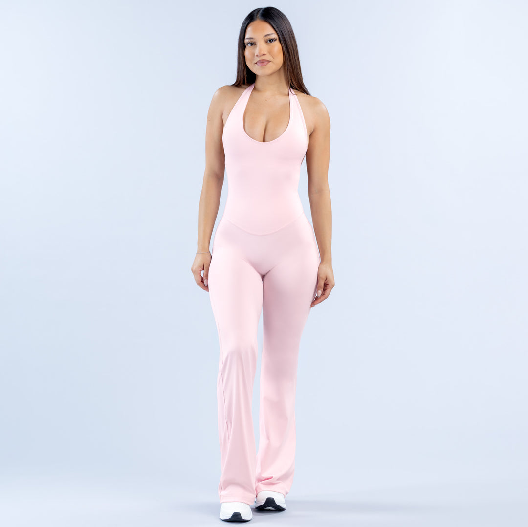 Women's light pink halter neck all-in-one, scoop neckline and fitted legs