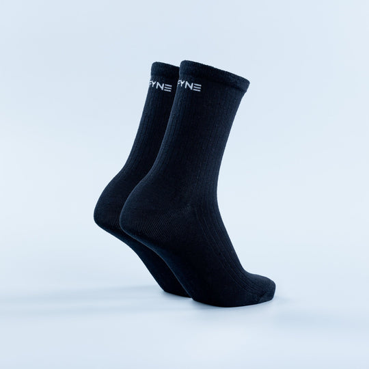 Dark navy crew socks with ribbed knit and small logo at the cuff