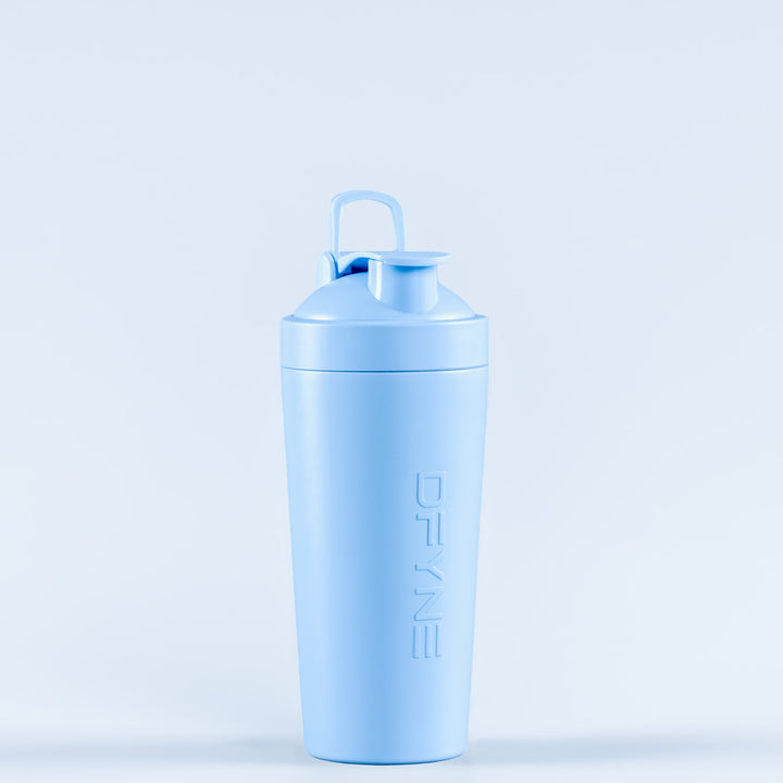 Blue shaker bottle with flip-top lid; vertical DELINE logo on side.