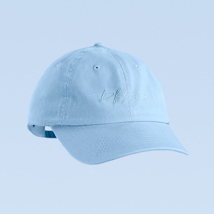 Light blue baseball cap with script logo embroidery and curved brim