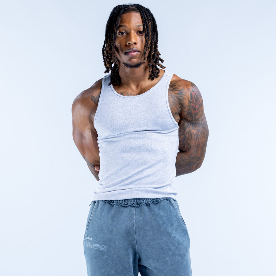 Light blue ribbed sleeveless vest with crew neck, worn on model