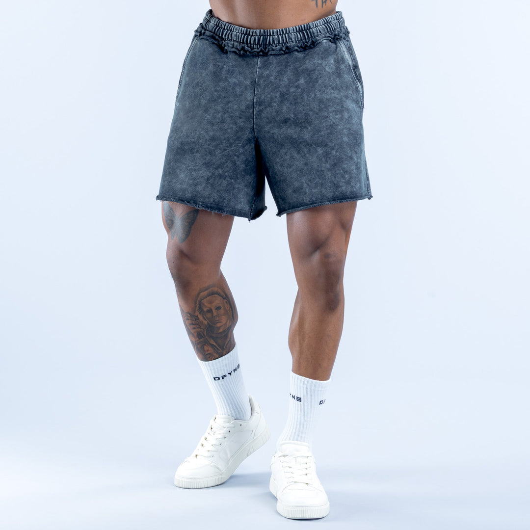 Washed navy-blue denim shorts with elastic waistband and side pockets