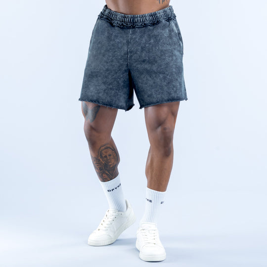 Washed navy-blue denim shorts with elastic waistband and side pockets