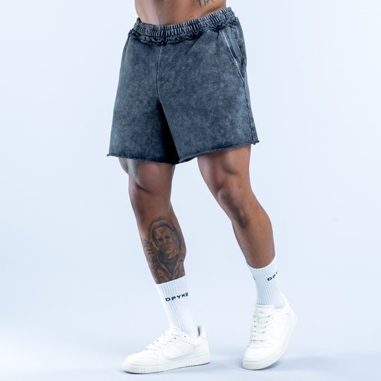 Washed navy-blue denim shorts with elastic waistband and front seam detail