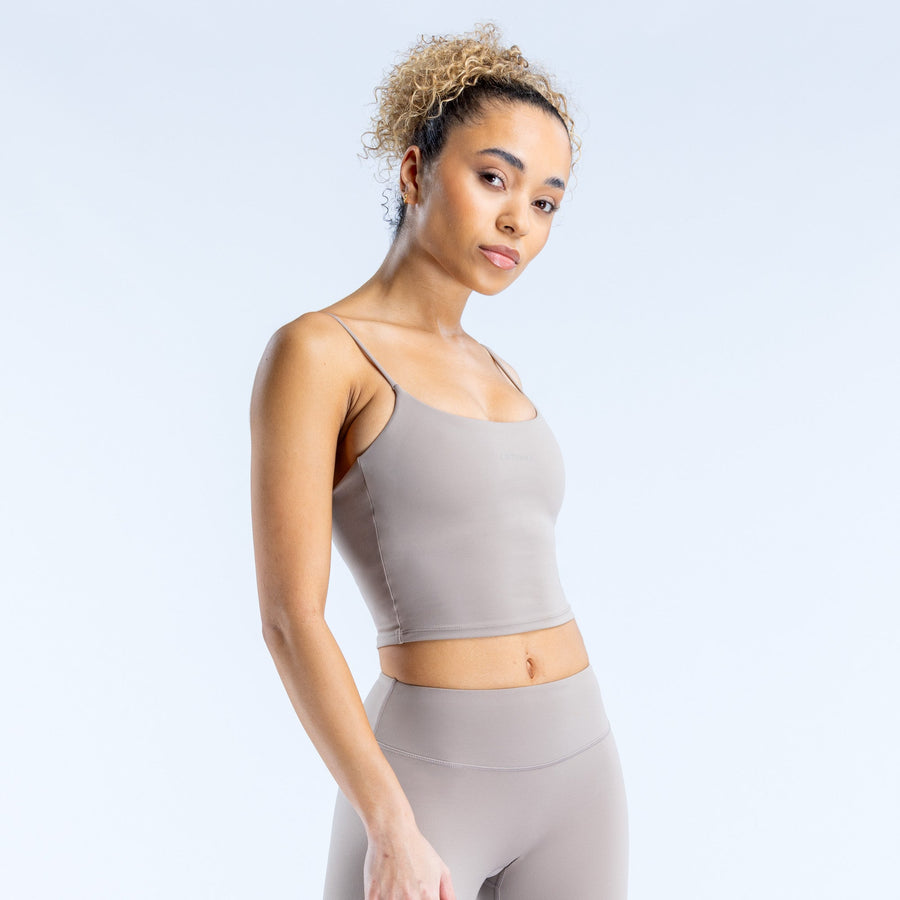 Gray strappy cropped tank top with spaghetti straps and smooth fabric