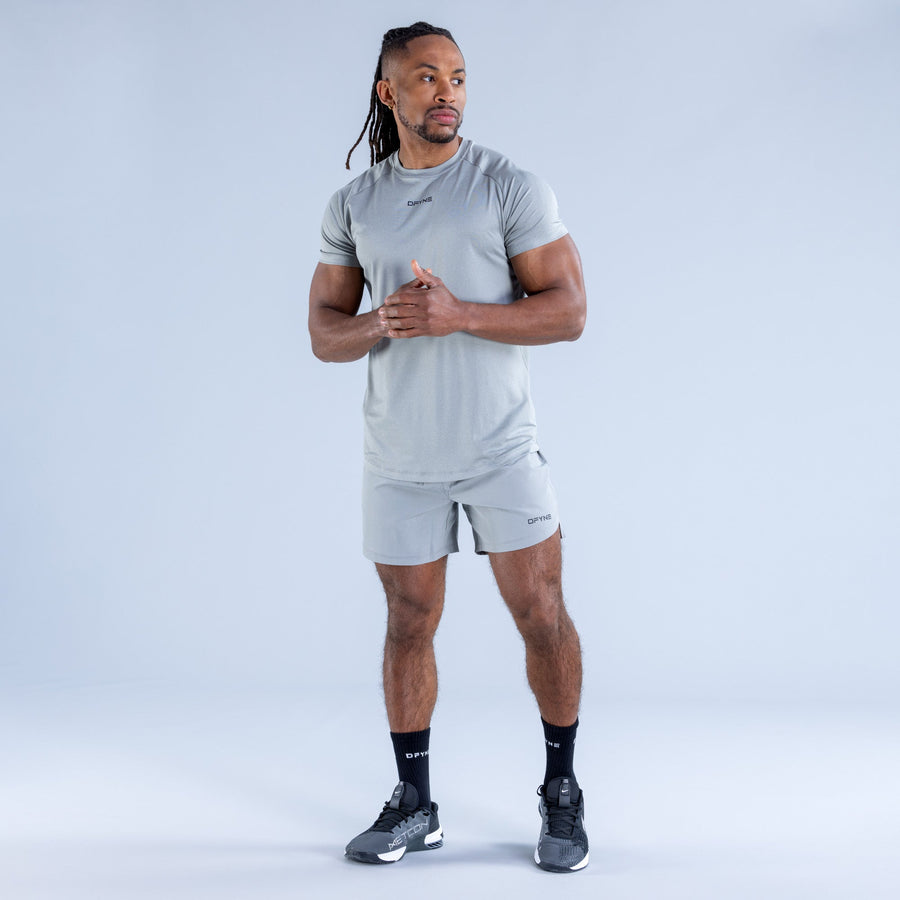 Light gray training T-shirt with short sleeves and small chest logo