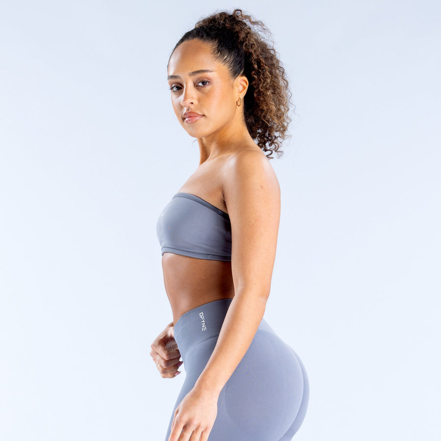 Backless bandeau sports bra in slate blue, side view with smooth underband
