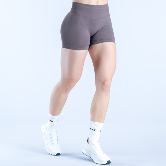 Dark gray 4.5-inch impact shorts, front view with contoured waistband and seams.
