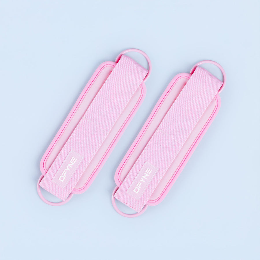 Pink ankle straps with Velcro closure and padded fabric webbing
