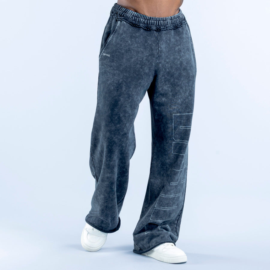 Washed jogger pants in dark navy with elastic waistband and side graphic panel