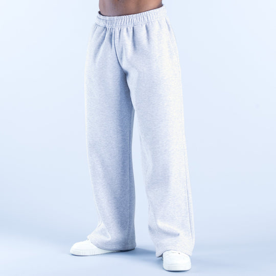Light gray straight-leg joggers with elastic waistband, side seams, and ribbed cuffs