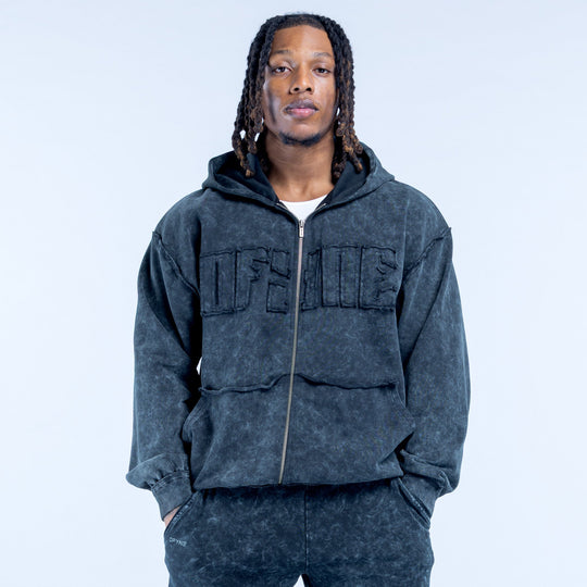 Dark gray washed zip hoodie with hood, front zip, and bold chest lettering