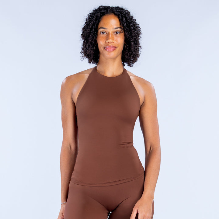 Brown longline halter tank top with high neckline and fitted waist seam
