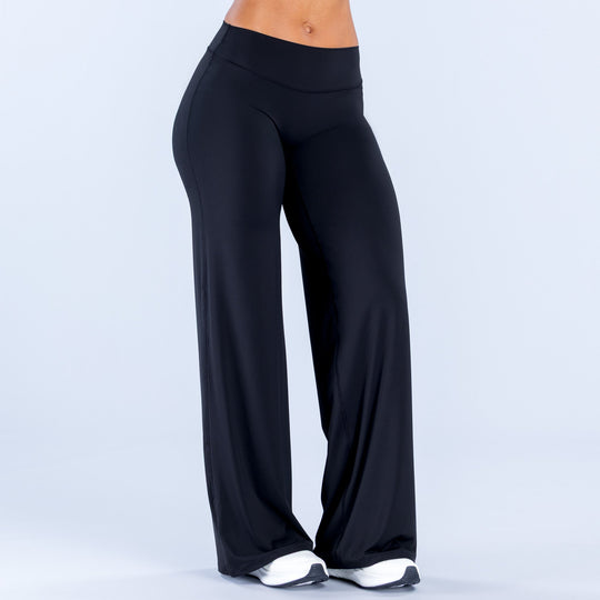 Wide-leg pants in dark black, front view with smooth drape and flared wide hems.