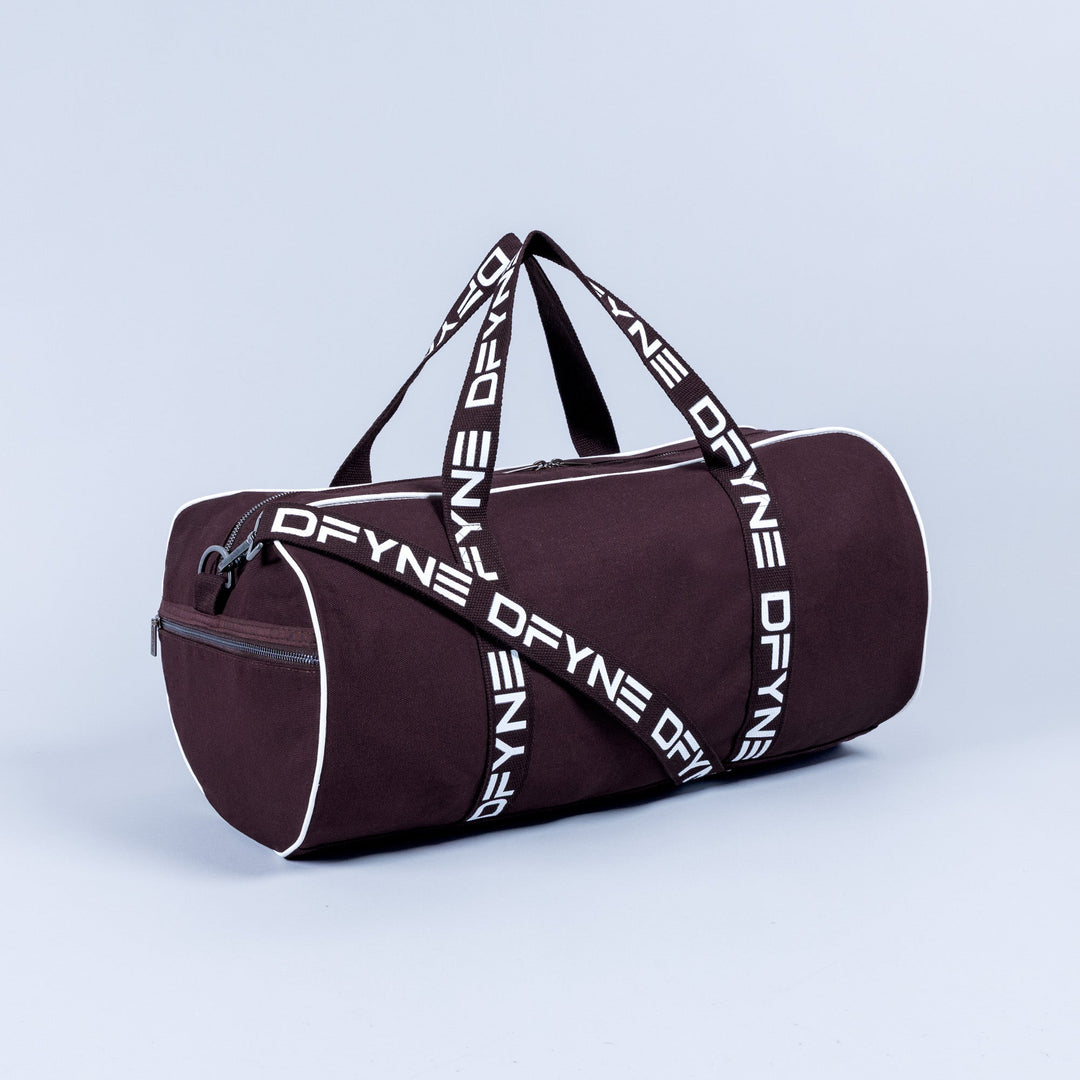 Burgundy duffle bag with white logo strap and top carry handles
