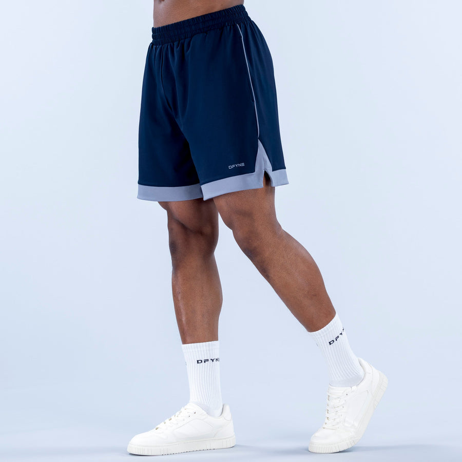 Navy jersey shorts with elastic waistband, light gray hem detail