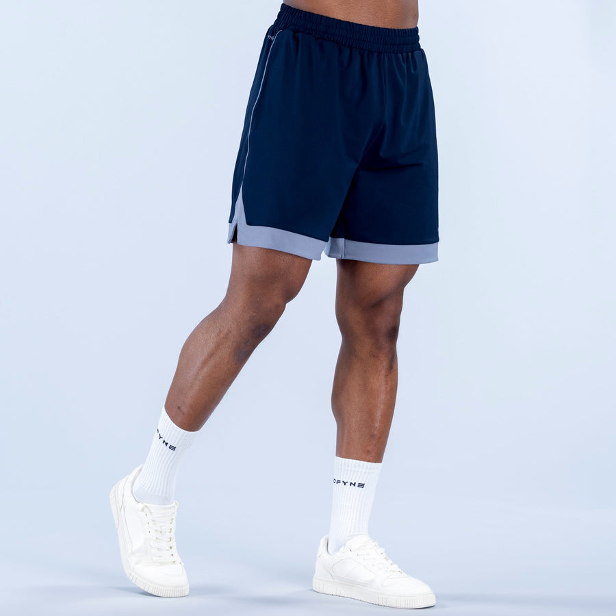 Navy jersey shorts with elastic waistband and light gray side trim