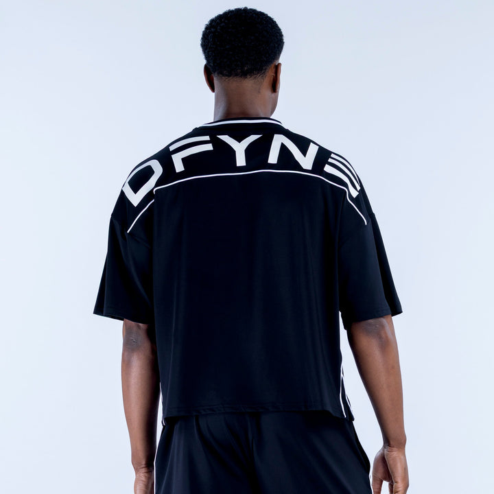 Black jersey with large back YN-style print and white trim around shoulders
