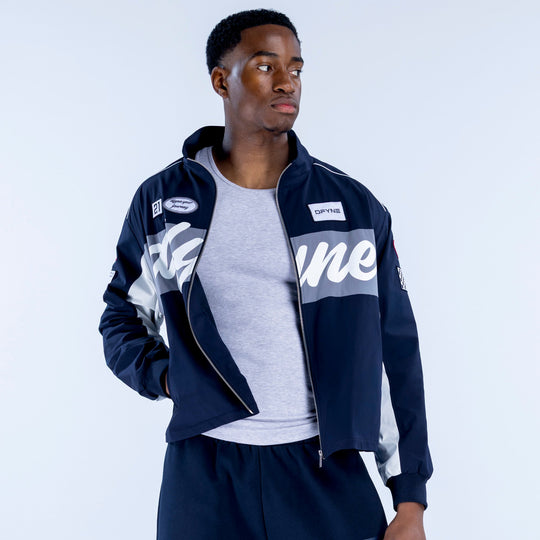Men's navy track jacket with white graphic patches and full-zip front