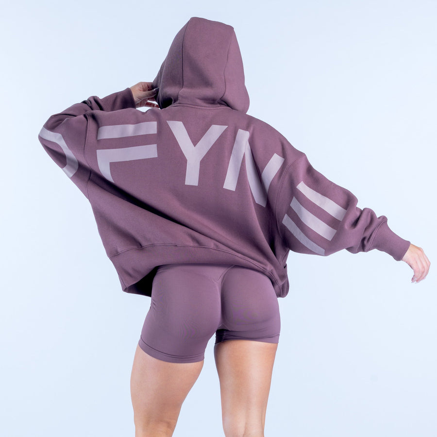 Mauve hoodie with large back “HY” graphic, hood up, kangaroo pocket, long sleeves