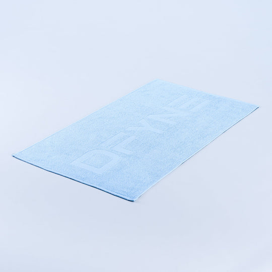 Light blue gym towel, folded square with stitched edges
